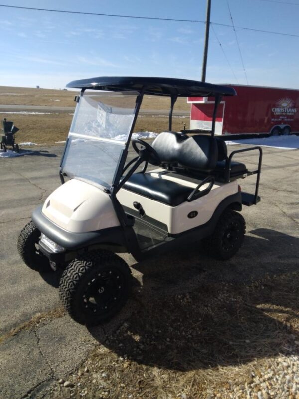 Christians carts White custom built gas golf cart